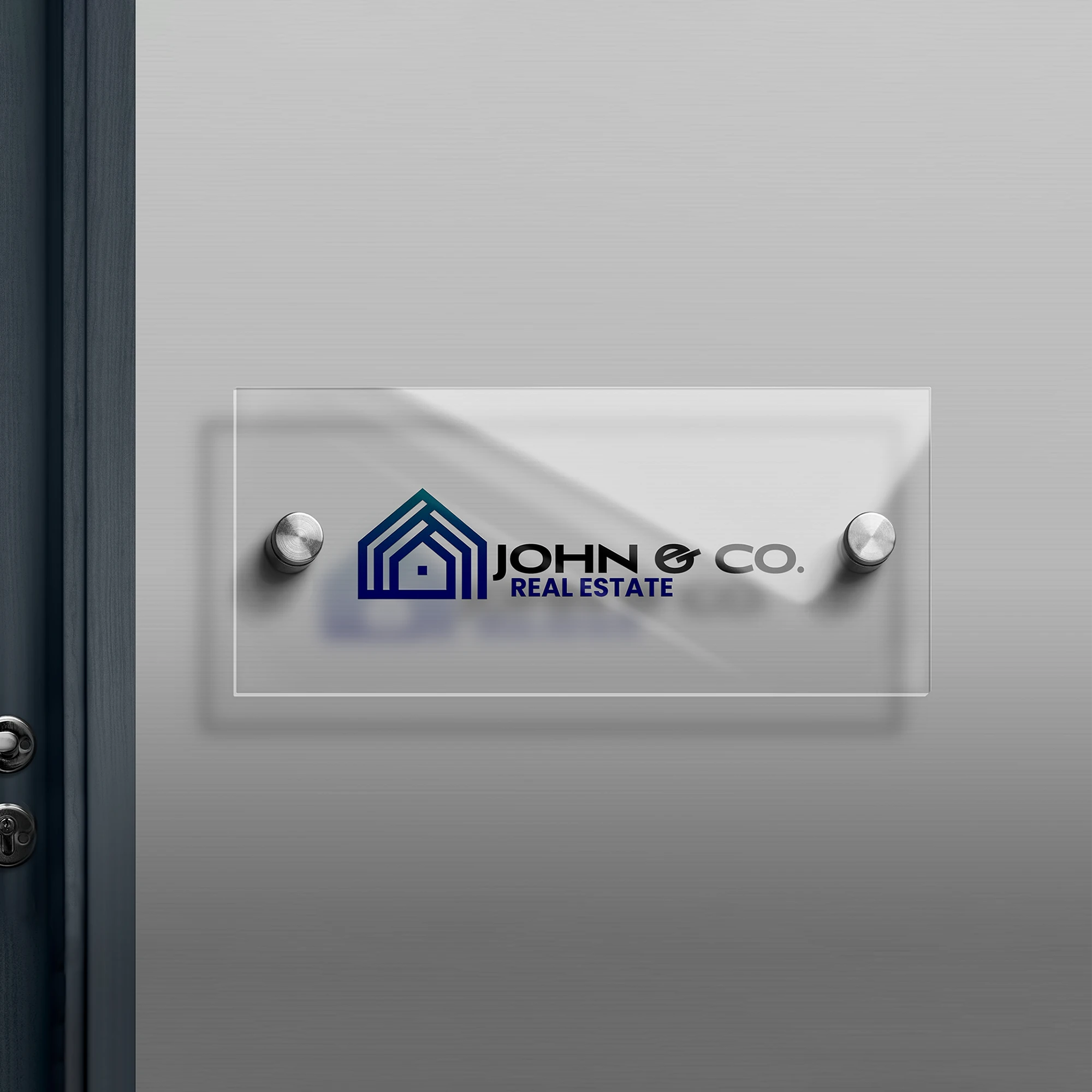 acrylic sign for real estate company mounted onto wall