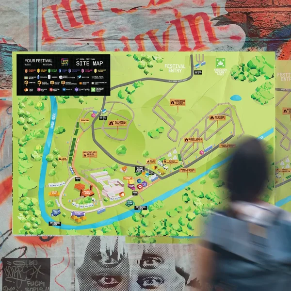 person looking at corflute site maps for festival