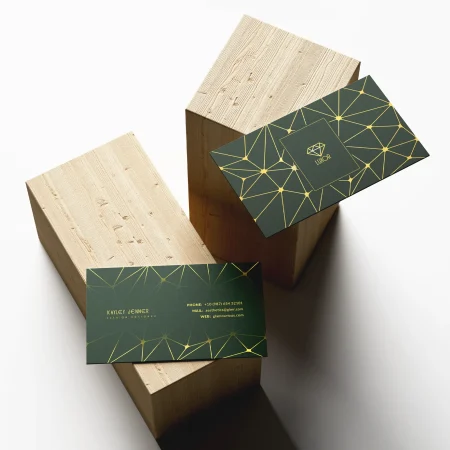 premium business cards in a green and gold design with foil for a luxury look