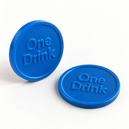 Blue plastic tokens with One Drink lettering embossed in the same coloured plastic.